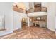 Spacious living room with high ceilings and a stone fireplace at 105 Kingfisher Way, Louisburg, NC 27549