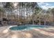 Relaxing pool area with outdoor kitchen and gazebo at 105 Kingfisher Way, Louisburg, NC 27549