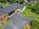 Aerial view showing house, detached garage, and yard at 127 Fairfield Cir, Dunn, NC 28334
