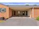 Brick carport with attached storage and access to the house at 127 Fairfield Cir, Dunn, NC 28334