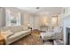 Bright living room featuring a fireplace and comfortable seating at 127 Fairfield Cir, Dunn, NC 28334