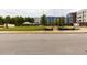 Exterior view of apartment building under construction, showing landscaping and parking at 2202 Gathering Square Ct, Fuquay Varina, NC 27526