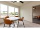 Charming dining area with window views and four chairs at 2202 Gathering Square Ct, Fuquay Varina, NC 27526