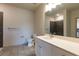 Modern bathroom with white vanity, grey tile shower, and toilet at 2204 Gathering Square Ct, Fuquay Varina, NC 27526