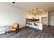 Modern kitchen with white cabinets, granite countertops, and a breakfast bar at 2204 Gathering Square Ct, Fuquay Varina, NC 27526