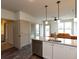 Modern kitchen with granite countertops and stainless steel appliances at 2204 Gathering Square Ct, Fuquay Varina, NC 27526