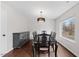 Elegant dining room features a chandelier and large window at 4708 River Boat Landing Ct, Raleigh, NC 27604