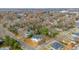 Aerial view of a charming house nestled in a tree-lined neighborhood at 603 W Davis St, Burlington, NC 27215
