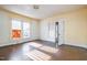 Bright bedroom with hardwood floors and window at 603 W Davis St, Burlington, NC 27215