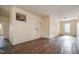 Spacious bedroom with hardwood floors and a door at 603 W Davis St, Burlington, NC 27215