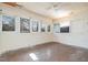 Room with hardwood floors and large windows at 603 W Davis St, Burlington, NC 27215