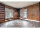 Bedroom with built-in shelving and hardwood floors at 603 W Davis St, Burlington, NC 27215