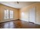 Bright bedroom featuring hardwood floors and a ceiling fan at 603 W Davis St, Burlington, NC 27215