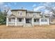 Two story home with wrap-around porch and mature trees at 603 W Davis St, Burlington, NC 27215