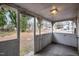 Front porch with white railings and wood flooring at 603 W Davis St, Burlington, NC 27215