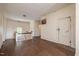 Long hallway with hardwood floors and a railing at 603 W Davis St, Burlington, NC 27215