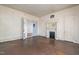 Large living room with hardwood floors and fireplace at 603 W Davis St, Burlington, NC 27215