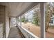 Long front porch with white railings and view of yard at 603 W Davis St, Burlington, NC 27215