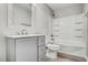 Clean bathroom, featuring a bathtub, toilet and vanity with a framed mirror at 7201 Hunt Valley Trl, Wendell, NC 27591