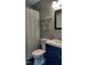 Bathroom with a toilet, sink, shower, and dark vanity at 807 W Trinity Ave # 241, Durham, NC 27701