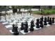 Giant outdoor chessboard game in community courtyard at 807 W Trinity Ave # 241, Durham, NC 27701