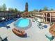 Community pool and courtyard with building and clock tower views at 807 W Trinity Ave # 241, Durham, NC 27701