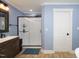 Modern bathroom with a large shower and sleek fixtures at 1354 Mudham Rd, Wendell, NC 27591