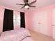 Bright bedroom with twin bed and double door closet at 1354 Mudham Rd, Wendell, NC 27591