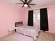 Charming bedroom with a twin bed and window views at 1354 Mudham Rd, Wendell, NC 27591