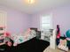 bedroom with a twin bed and play area at 1354 Mudham Rd, Wendell, NC 27591