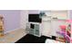 bedroom with TV, storage, and toys at 1354 Mudham Rd, Wendell, NC 27591