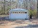 White detached garage with single door at 1354 Mudham Rd, Wendell, NC 27591