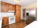 Kitchen with wood cabinets and stainless steel appliances at 1354 Mudham Rd, Wendell, NC 27591