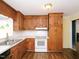 Kitchen with wood cabinets and stainless steel appliances at 1354 Mudham Rd, Wendell, NC 27591