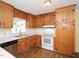 Kitchen with wood cabinets and stainless steel appliances at 1354 Mudham Rd, Wendell, NC 27591