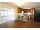 Kitchen with wood cabinets and breakfast bar at 1354 Mudham Rd, Wendell, NC 27591