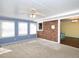 Spacious sunroom with brick feature wall and access to kitchen at 1354 Mudham Rd, Wendell, NC 27591