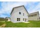 White two story house with backyard patio at 163 Vili Dr, Broadway, NC 27505