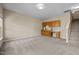 Spacious basement recreation area with wet bar and built-in cabinetry at 1674 Snowmass Way, Durham, NC 27713
