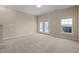 Bright and airy basement room with French doors leading to patio at 1674 Snowmass Way, Durham, NC 27713