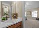 Clean bathroom with single sink vanity and shower/tub combo at 1674 Snowmass Way, Durham, NC 27713