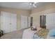 Spacious bedroom with double doors and carpet flooring at 1674 Snowmass Way, Durham, NC 27713