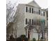 Two-story townhome with neutral siding and a front-facing garage at 1674 Snowmass Way, Durham, NC 27713
