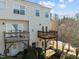 Townhouse exterior with two-level deck at 1674 Snowmass Way, Durham, NC 27713