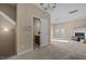 Living room with fireplace, access to deck, and powder room at 1674 Snowmass Way, Durham, NC 27713