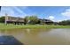 Lakefront property with a large home and community pavilion at 30 Hidden Lake Dr, Franklinton, NC 27525