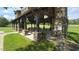 Community pavilion with stone fireplace and picnic tables at 30 Hidden Lake Dr, Franklinton, NC 27525