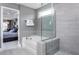 Elegant bathroom with soaking tub, walk-in shower, and double vanity at 47 Rosedale Way, Pittsboro, NC 27312