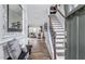 Bright and spacious entryway with hardwood floors and staircase at 47 Rosedale Way, Pittsboro, NC 27312