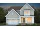 Two story home with gray siding, white trim, and a two-car garage at 47 Rosedale Way, Pittsboro, NC 27312